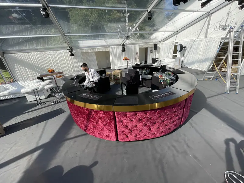 Red Chesterfield bar set for a luxury wedding reception