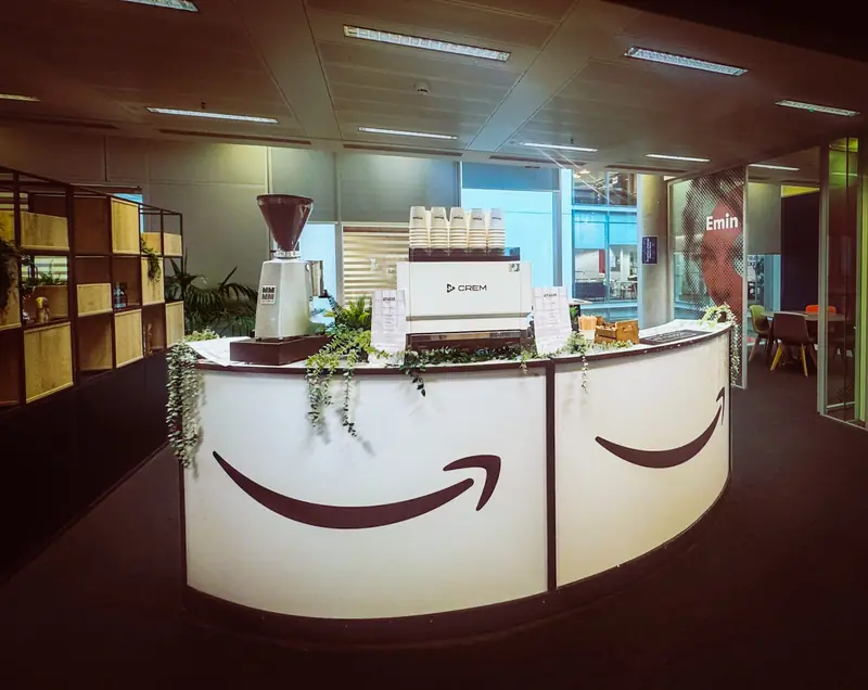 Branded coffee bar serving guests at an Amazon corporate event