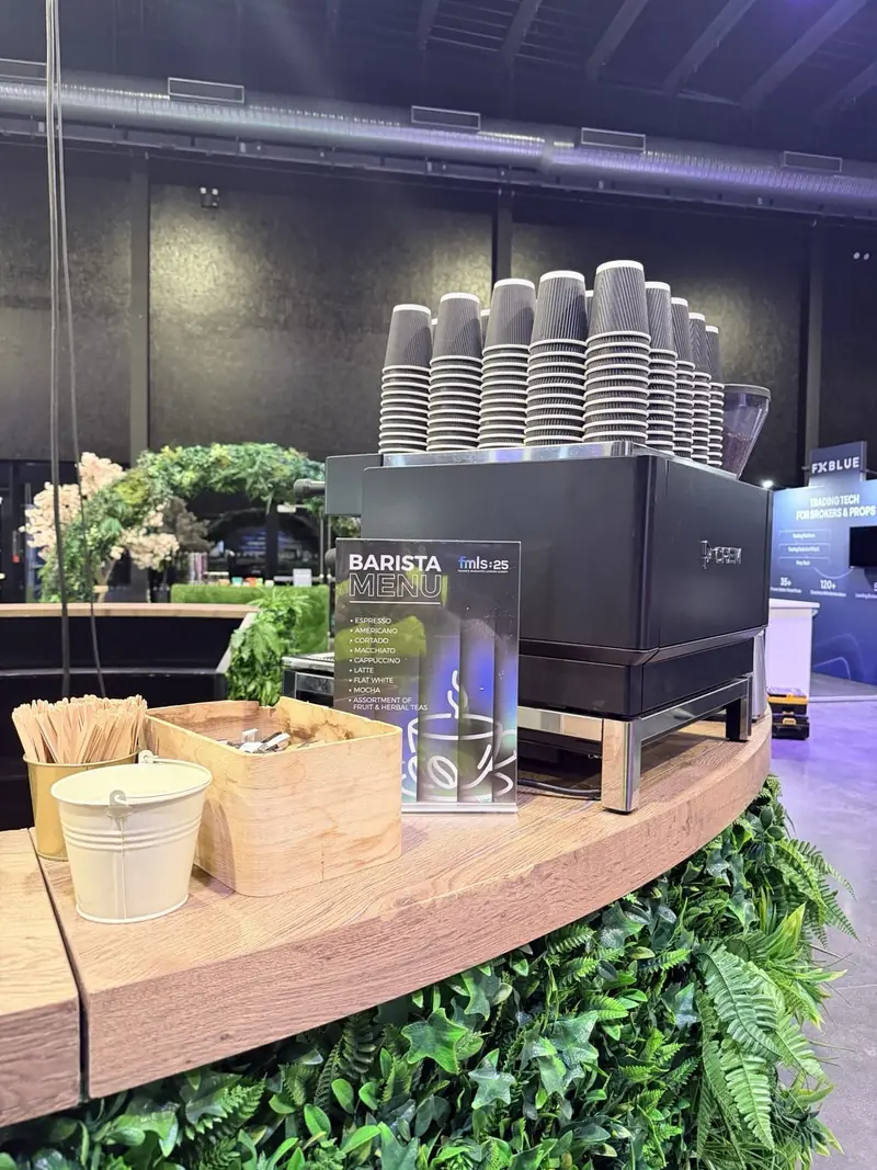The Mr Flavour branded barista coffee station with the FMLS:25 barista menu at the Finance Magnates London Summit