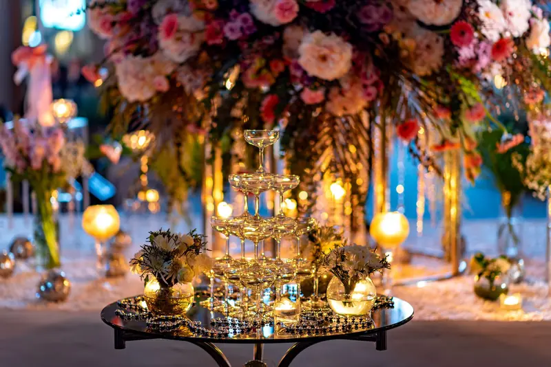 Elegant wedding table setting with a champagne tower